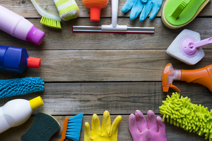 Cleaning supplies around a wooden deck
